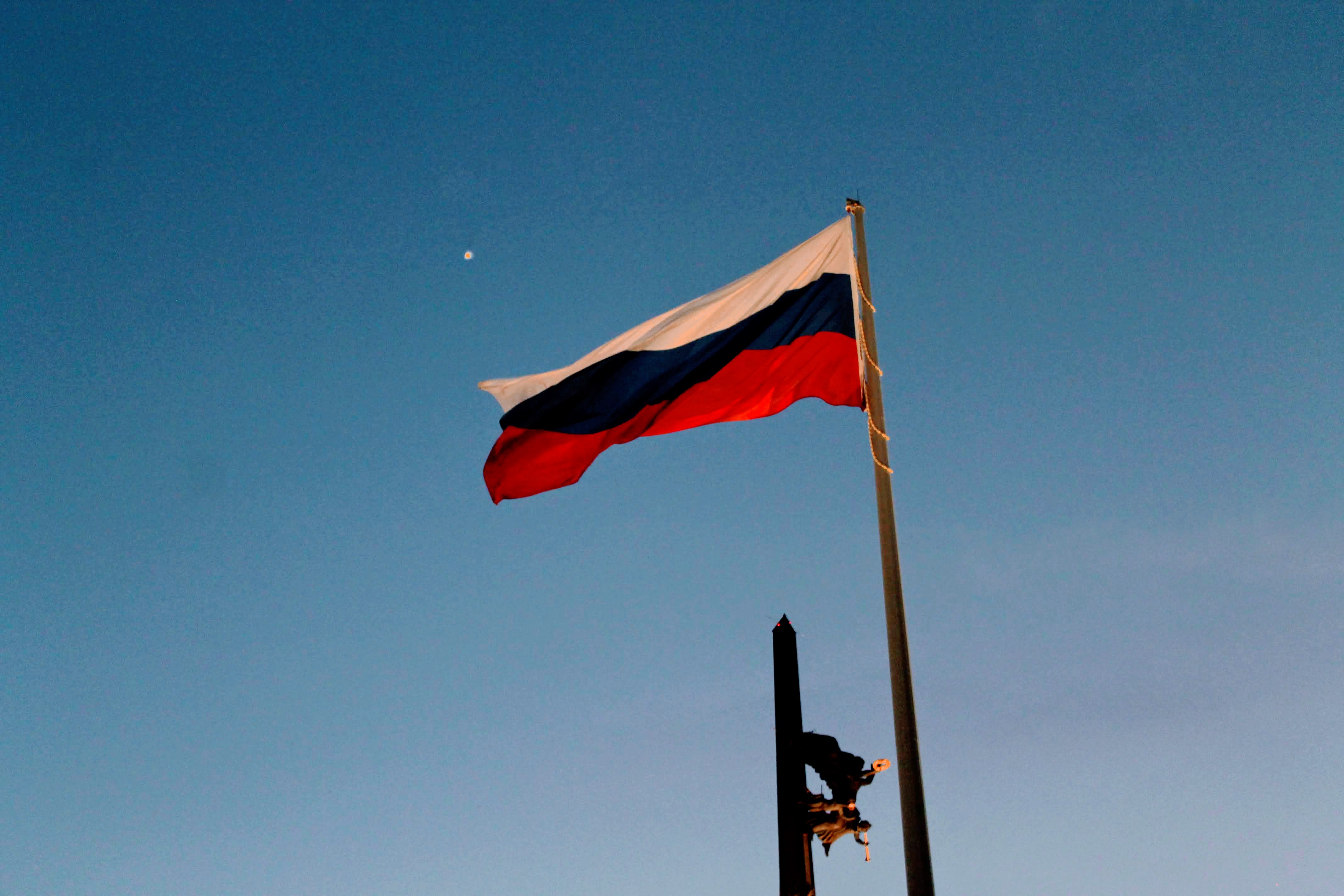 Russian flag with a monument